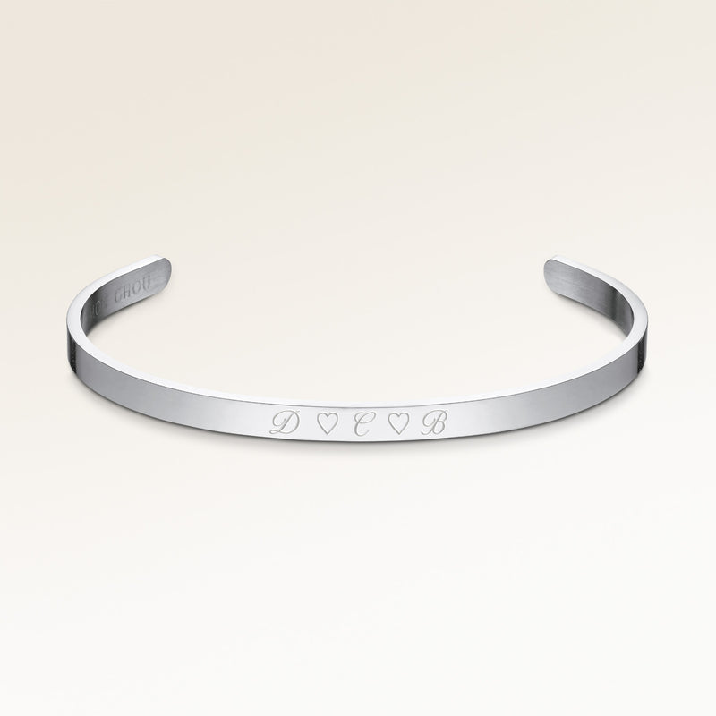 Bangle bracelet in silver with smooth outside, space for personalized engraving