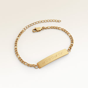 Personalized bar gold bracelet with space for engraving of text or coordinates