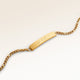 Personalized bar gold bracelet with space for engraving of text or coordinates