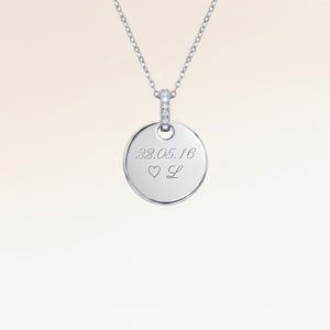Personalised round silver necklace with white zirconia and engraved date and initial – room for text, coordinates or handwriting on the back