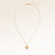 Full heart-shaped necklace in gold fully laid out with fine adjustable gold chain and minimalist heart pendant for personalized engraving