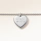 Close-up of minimalist heart-shaped heart pendant in silver with smooth surface and space for personalized engraving on the front and back