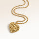 Personalized heart-shaped gold necklace with softly melted finish and space for engraving of text, coordinates or handwriting on the back