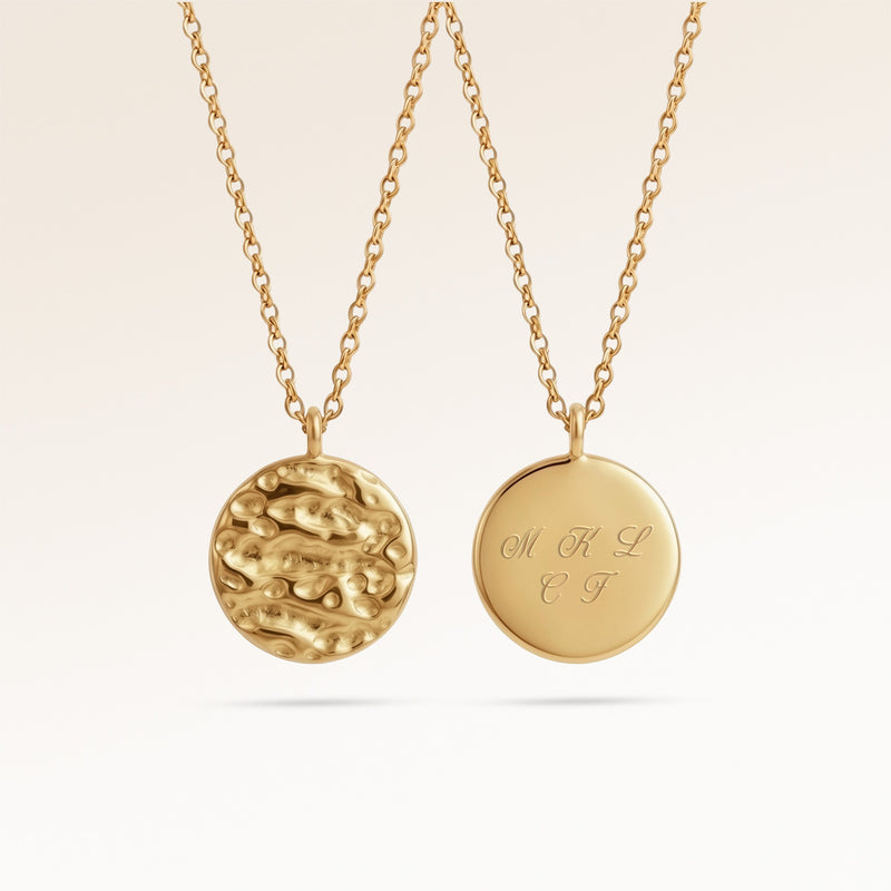 Personalized round gold necklace with softly melted finish and space for engraving of text, coordinates or handwriting on the back