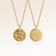 Personalized round gold necklace with softly melted finish and space for engraving of text, coordinates or handwriting on the back