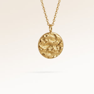 Round gold necklace with softly melted finish side view, space for engraving on back
