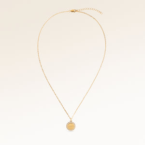 Full round necklace in gold fully laid out with fine adjustable gold chain and minimalist pendant for personalized engraving