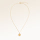 Full round necklace in gold fully laid out with fine adjustable gold chain and minimalist pendant for personalized engraving