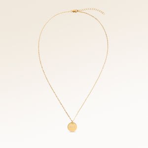 Full round necklace in gold fully laid out with fine adjustable gold chain and minimalist pendant for personalized engraving