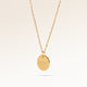 Round gold necklace with smooth surface side view, space for personalized engraving on the front and back
