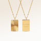 Personalized square gold necklace with ribbed sunburst pattern and space for engraving of text, coordinates or handwriting on the back