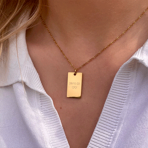 Personalized square gold necklace with space for engraving of text, coordinates or handwriting on the front and back