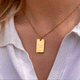 Personalized square gold necklace with space for engraving of text, coordinates or handwriting on the front and back