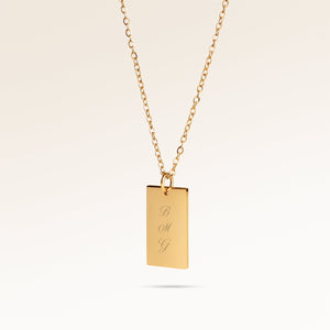 Square gold necklace with smooth surface side view, space for personalized engraving on the front and back